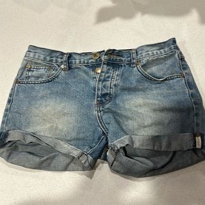 One denim short.